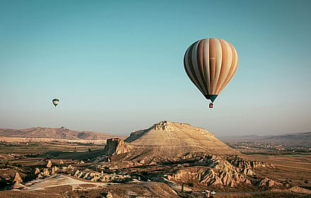 Above the Earth: Balloons Over Desert Landscapes'