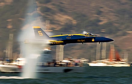 Fleet Week 2005. Blue Angels 5 making a low / high speed pass over the San Francisco bay creating a spectacular effect.'