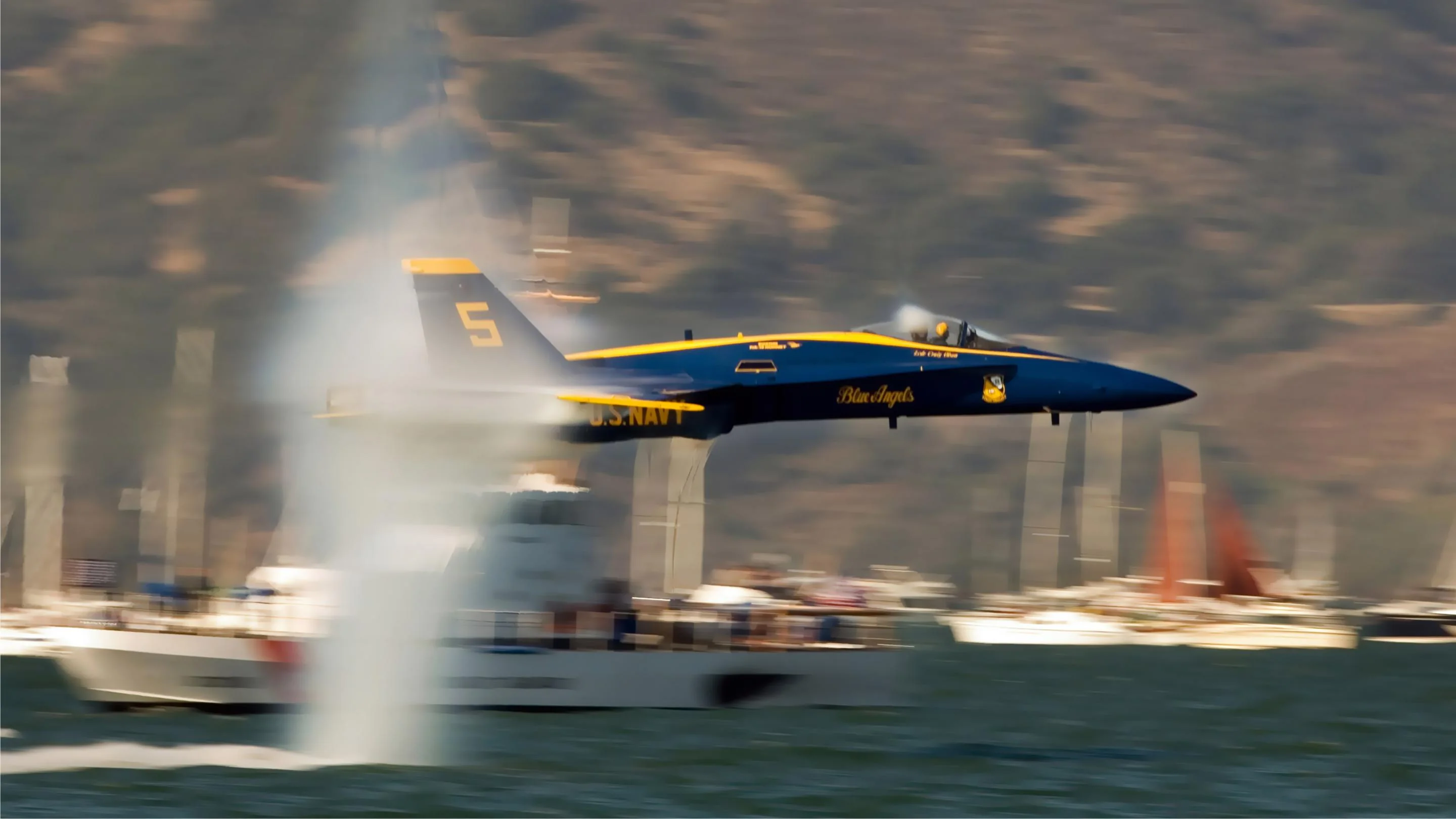 Fleet Week 2005. Blue Angels 5 making a low / high speed pass over the San Francisco bay creating a spectacular effect. picture 1 of 1